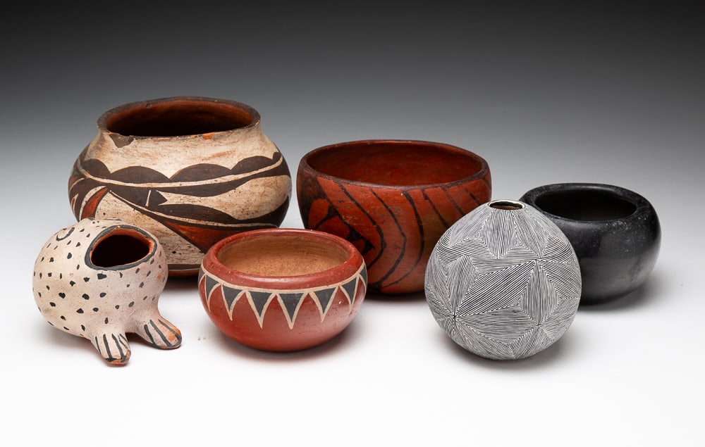 SIX NATIVE PUEBLO POTTERY PIECES.: First Nations. Early-20th Century. Acoma pot. Hairline crack and old chip to rim. 4"h. 5"dia. Early-20th Century. Maricopa bowl with black over red, primitive design. 3"h. 4.75"dia. Late-20th Century.