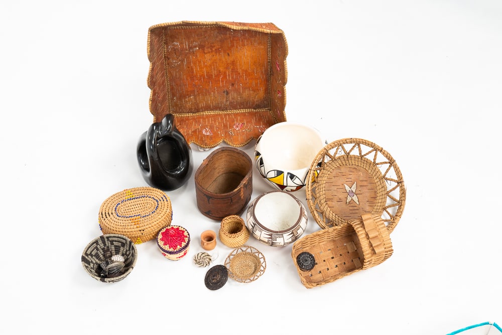 GROUP OF 20 FIRST NATIONS ARTICLES.: First Nations, 20th Century. Comprising a Santa Clara New Mexico pottery vase by Pauline Marie (signed), an Acoma pottery vase, two other pottery vases, 14 woven baskets, a bark basket, and a wood bas