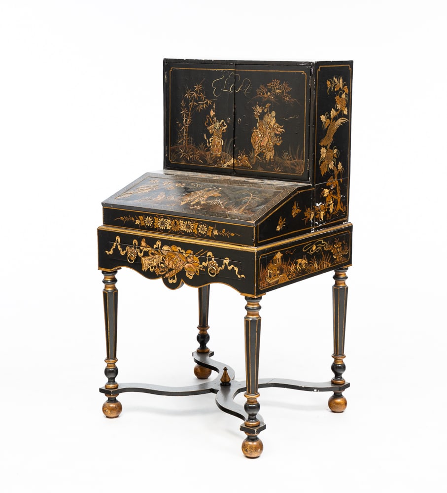 WILLIAM AND MARY STYLE CHINOISERIE DESK ON STAND.: English, mid-19th Century. Intricately decorated top with two doors that open to fitted interior with drawers and slant front that opens to sectioned area. Base with turned legs, shaped "X" stretcher 