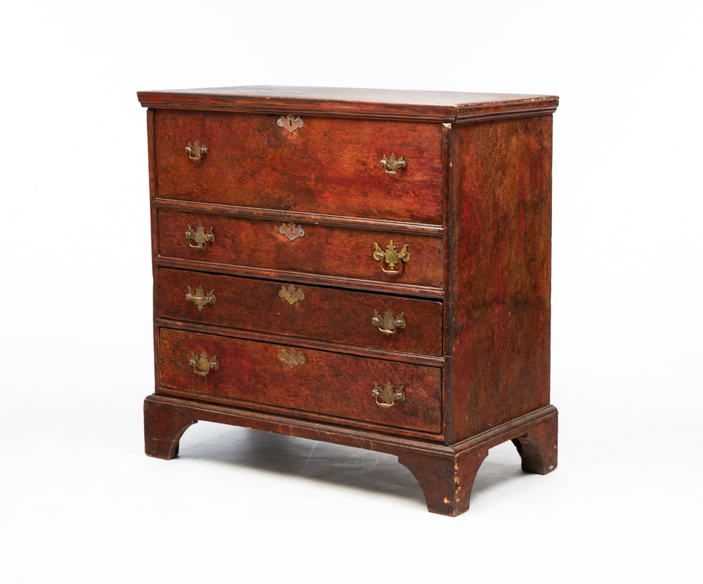 SPONGE DECORATED CHIPPENDALE BLANKET CHEST.: American, second half 18th Century. Pine. Top with applied edge molding. Front with two false drawer fronts over two dovetailed drawers. Bracket feet and worn reddish brown sponging. Some wear and poi