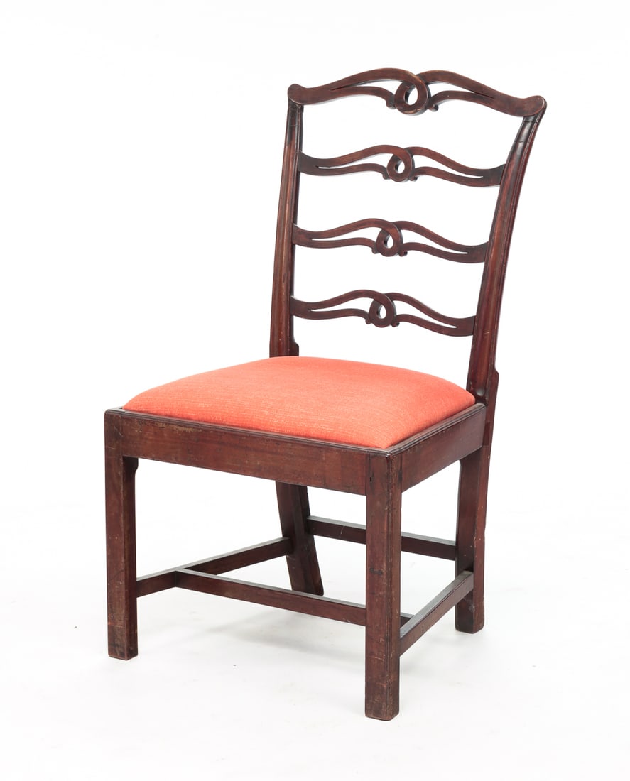 CHIPPENDALE SIDE CHAIR.: American, fourth quarter 19th Century. Mahogany. Ribbon back, square legs with beaded edge, "H" stretcher and upholstered slip seat. Wear, repair and is loose. Seat 17.5"h. Overall 38.5"h.