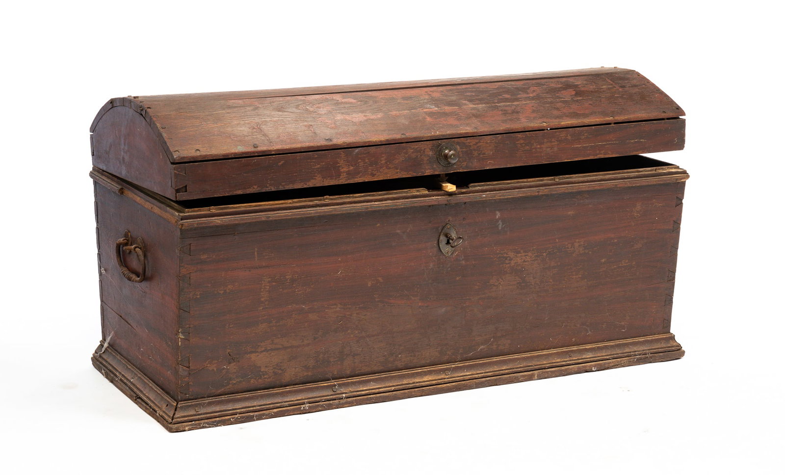 DOME-TOP SEA CHEST.: American, late-18th to early-19th Century. Oak. Canted front and back, molded base, rope twist hand-wrought iron bail handles, dovetail construction with square nails, lidded till with dovetailed draw