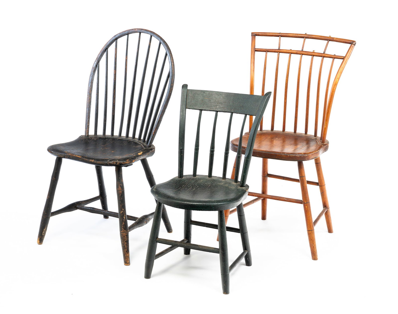 THREE SIDE CHAIRS.: American, first half 19th Century. Mixed woods. A bow-back Windsor, spindle back, bamboo turnings and worn block repaint. Age splits and repairs. Seat 17"h. Overall 39"h. A birdcage Windsor with bambo