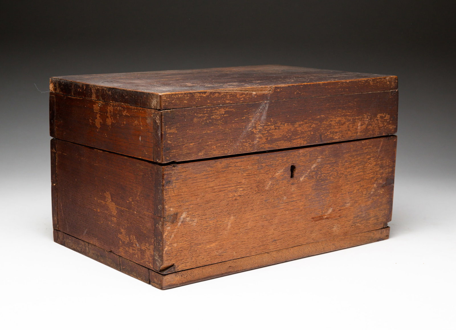 WALNUT DOCUMENT BOX.: American, mid-19th Century. Dovetail construction, hinged lid. With key. Worn finish. 7"h. 12"w. 7.75"d.