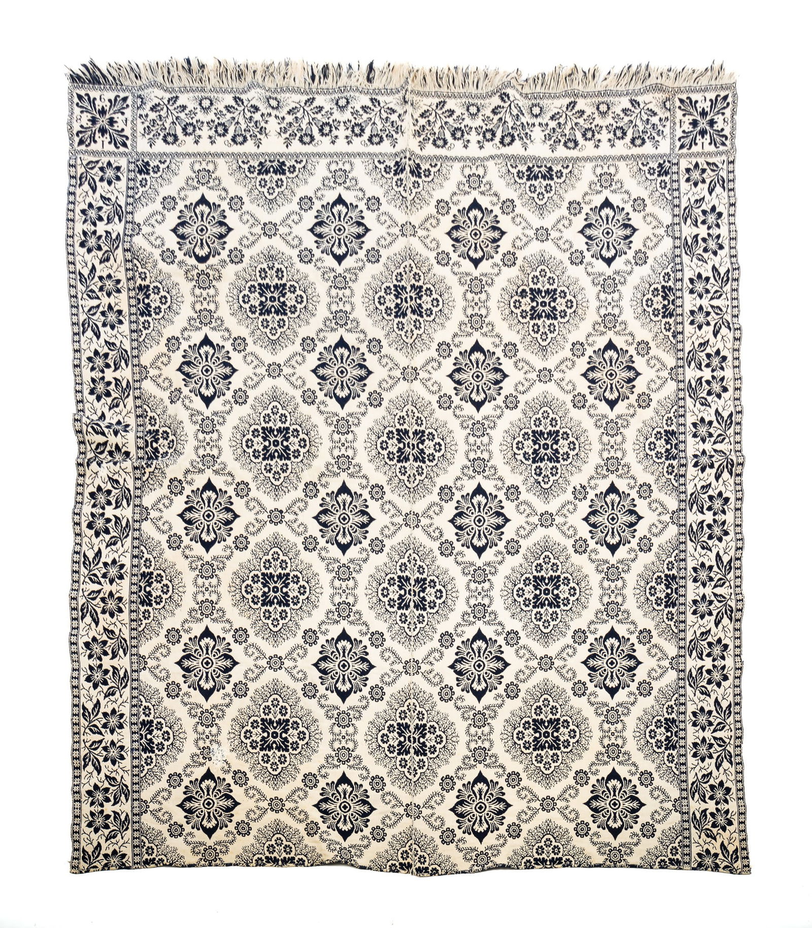 JACQUARD COVERLET BY JOHN MUIR.: American (Indiana, Putnam County), mid-19th Century (1849). Blue and white. Floral medallions with thistle border; side borders with floral design. Floral corner block; dated 1849. Two repaired holes