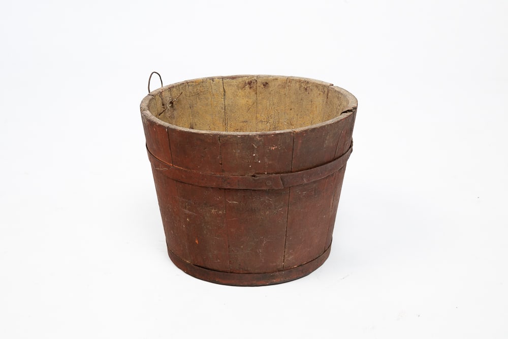 RED-PAINTED BUCKET.: 19th Century. Of stave construction. No lid. Wear throughout. 9"h.