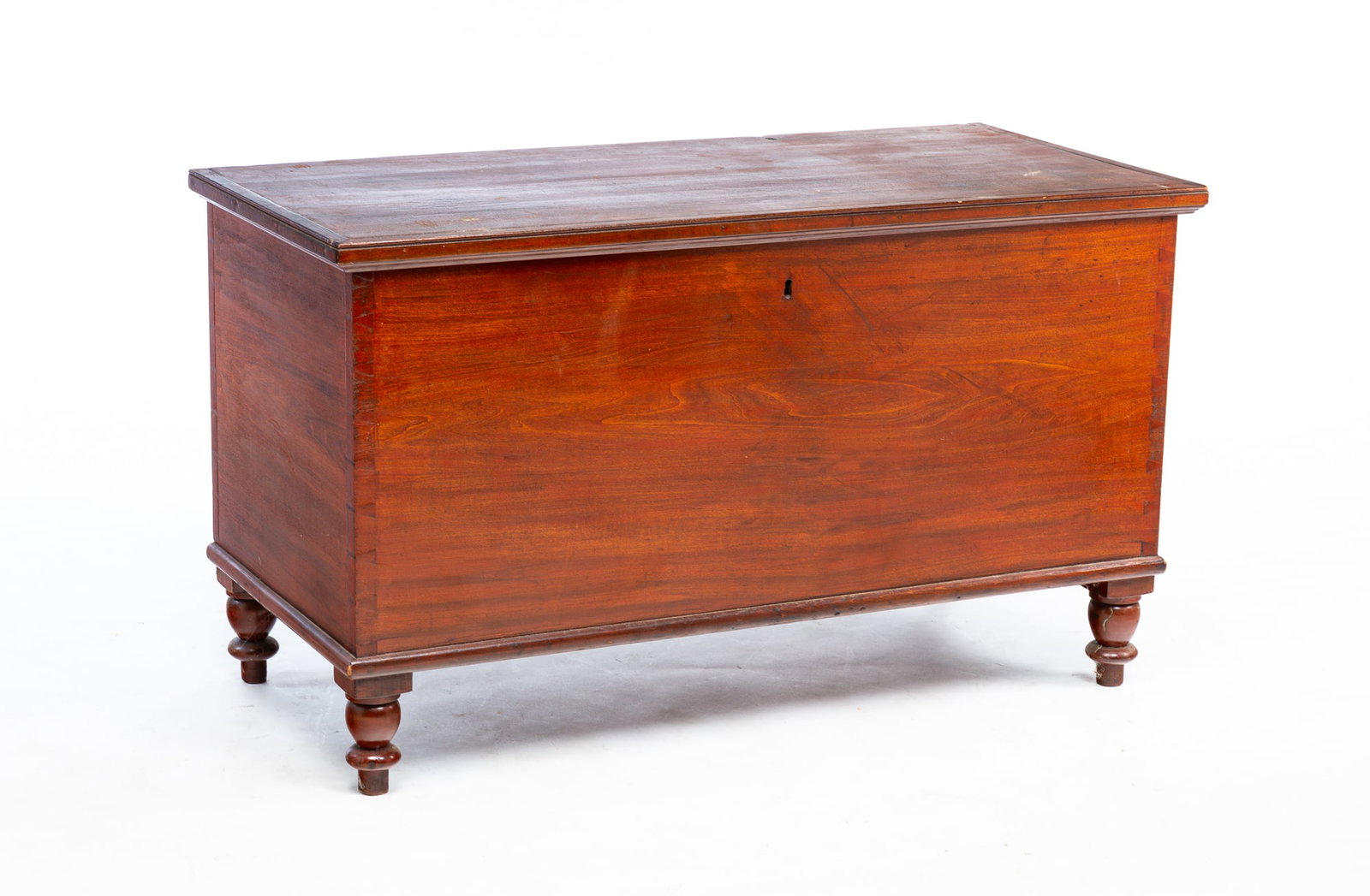 BLANKET CHEST ON TURNED LEGS.: American (Ohio), second half 19th Century. Poplar. Dovetail construction, covered till. Good condition with only a few minor areas of edge wear. 25.5"h. 44"w. 20.75"d.
