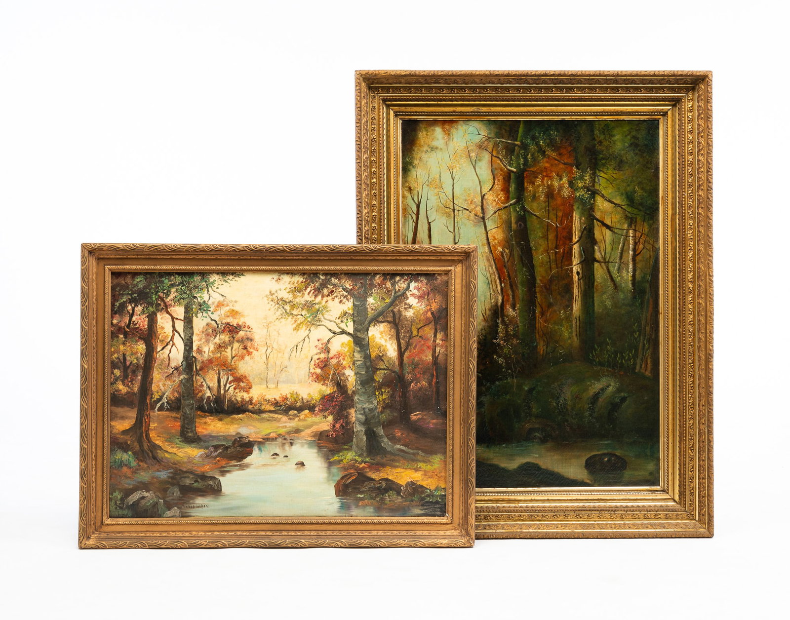 TWO LANDSCAPE PAINTINGS OF A WOODLAND STREAM.: American. The first, 19th Century, signed "MARIE WILSON" lower left, oil on linen, in gilt frame. With losses to frame. 22"h. 30"w. Framed 26.5"h. 34.5"w. The second, 18th Century, unsigned, oil on ca