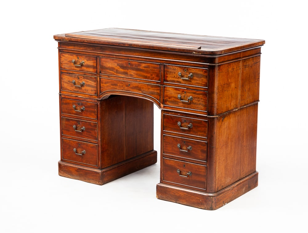REGENCY STYLE ARCHITECT'S DESK.: English, second half 19th Century. Mahogany with pine secondary. In three pieces. Leather inlay adjustable top, top two drawers open to storage and six lidded compartments, front of drawers fold down
