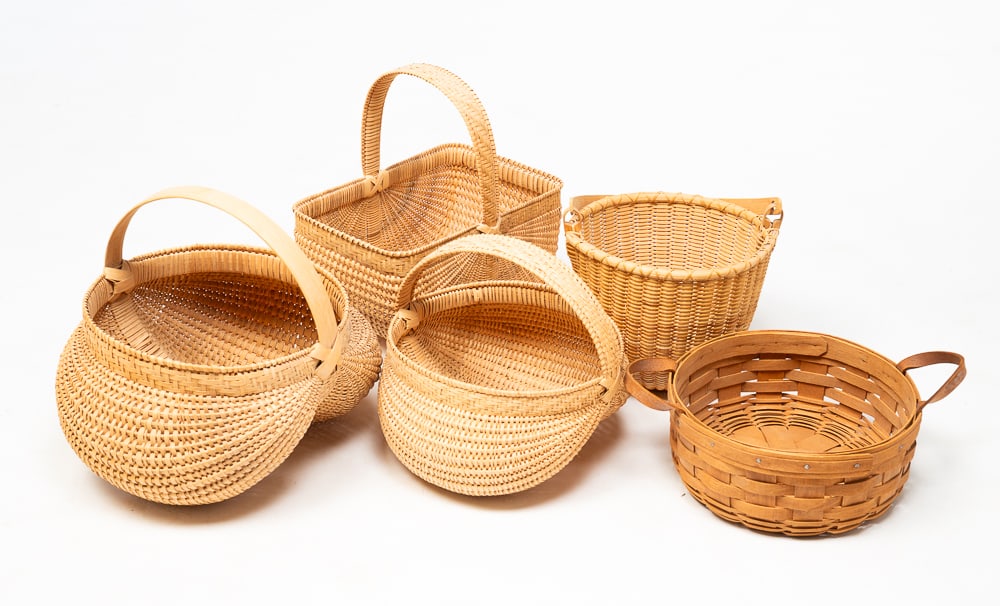FIVE CONTEMPORARY BASKETS.: American, late-20th Century. Comprising two white oak buttocks baskets, a white oak fan basket signed "Haskel W. Merritt. 1992" on interior, a Shaker-style gathering basket, and a Longaberger low, rou