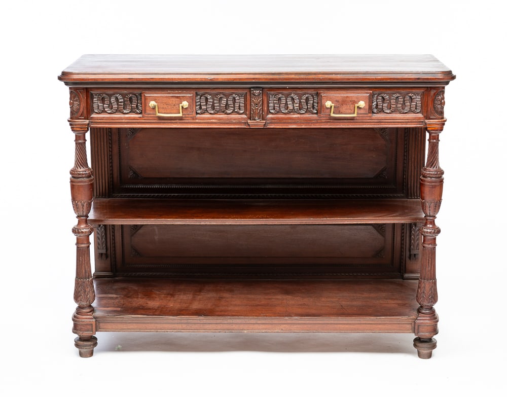 VICTORIAN SIDEBOARD.: European, late-19th Century. Walnut with oak secondary. Marble top, folding gallery backwith shelf, two dovetailed drawers with carved ribbon fronts. Two lower shelves, carved and turned legs, turned 
