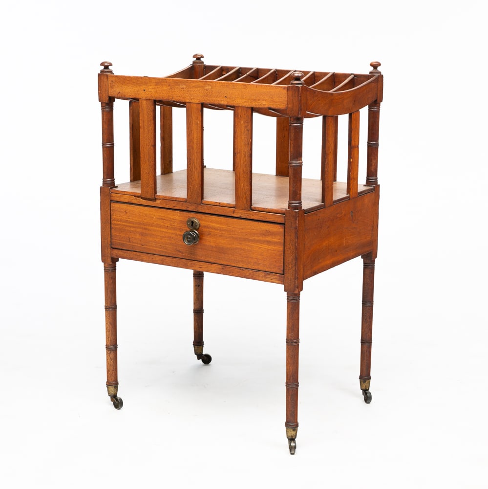CANTERBURY.: English, mid-19th Century. Mahogany with oak secondary. Curved separators, slot sides, slender turned legs with knob finials, dovetailed drawer and old dry finish. Some sun fading and a little damage.