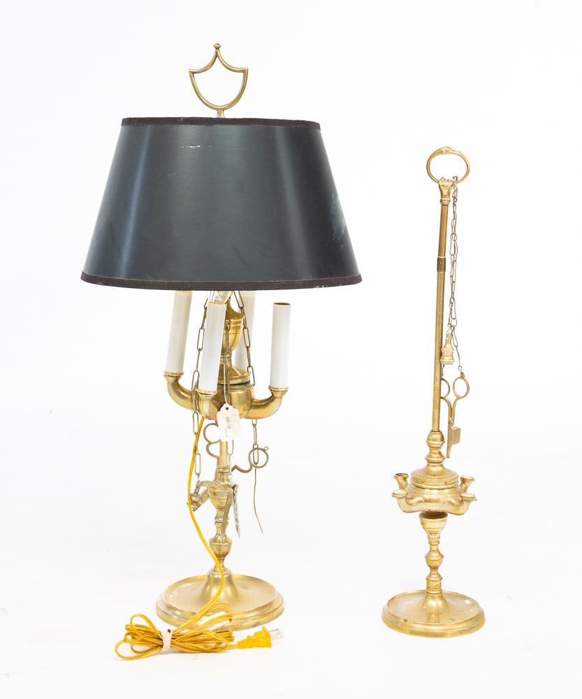 TWO LUCERNA LAMPS.: European, 20th Century. Brass. Both have four burners and cleaning tools. One has been electrified. 27"h. And one can still be used as a fluid burning lamp. 23"h.