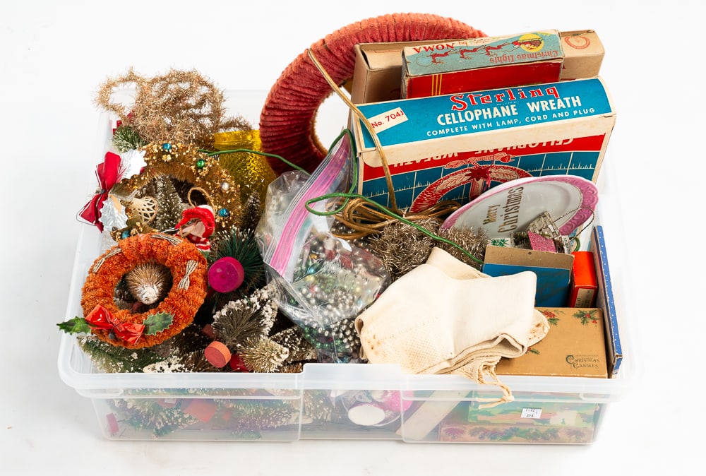 ASSORTED CHRISTMAS DECORATIONS.: Mid- to late-20th Century. Including candles, candle holders and clips, tinsel, ornaments, bottle brush trees and wreaths, boxed wreaths and lights. Wear and loss.