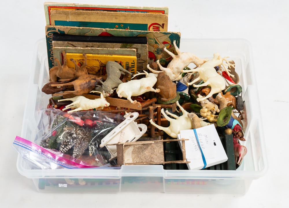 ASSORTED CHRISTMAS ARTICLES.: Late-19th and early-20th Century. Includes books, bisque Santa figurines, German pottery nativity scene and fences. Varying wear and loss.