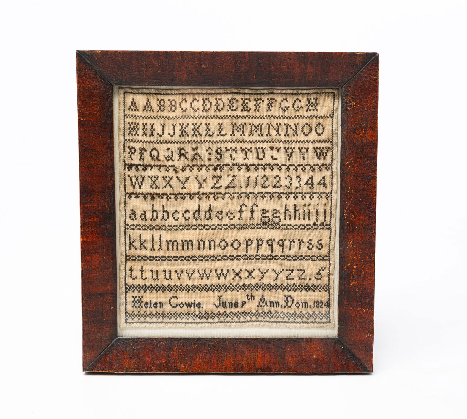 SAMPLER BY HELEN COWIE.: England, dated June 9th 1824. Linen with cotton thread. Uppercase and lowercase letters. Signed. Professionally restored. 12.25"h. 11.25"w.