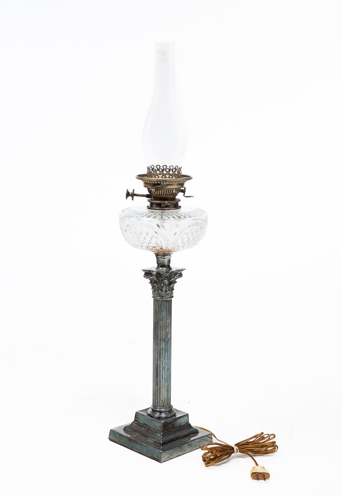 CRYSTAL AND SILVER PLATE BANQUET LAMP.: English, fourth quarter 19th Century. Cut glass font and silver plated composite order column on astepped base. Electrified.