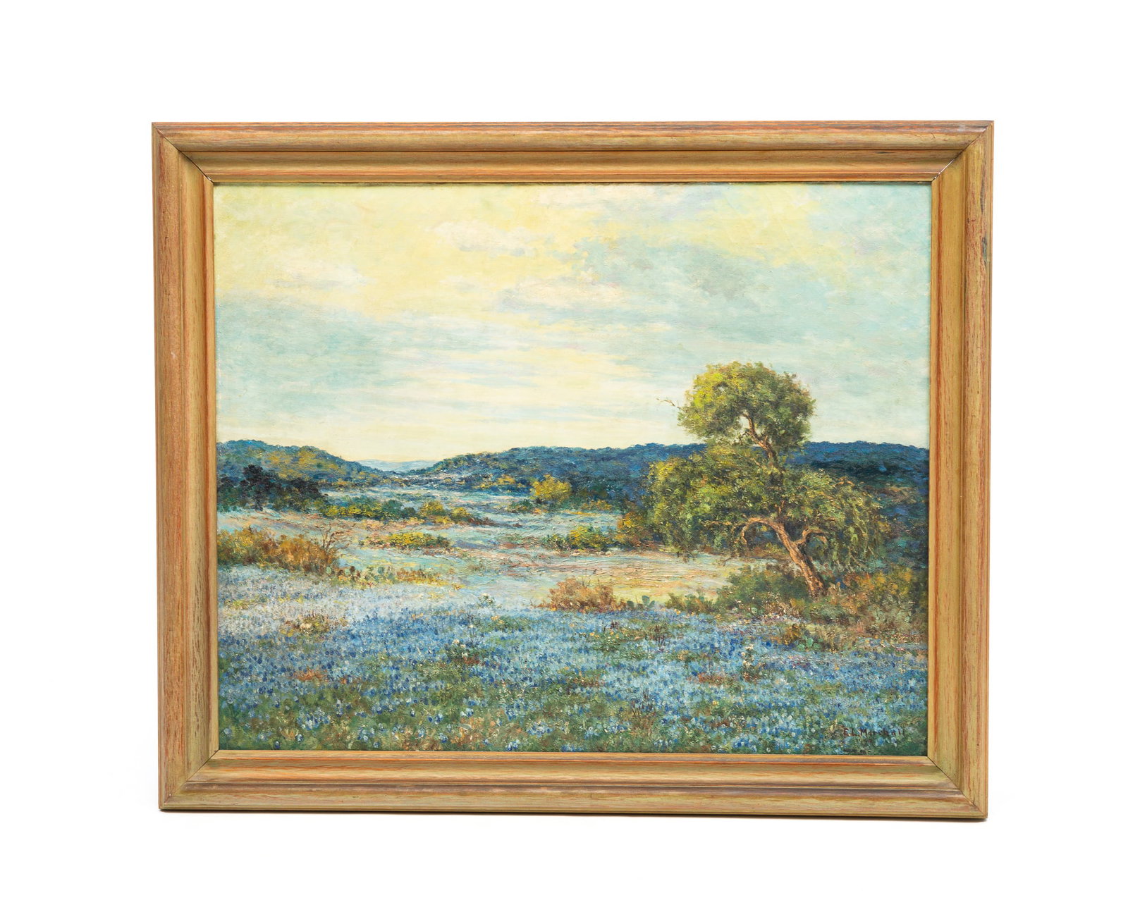 E.L. (EDWIN L.) MARSHALL (ACTIVE 1940-1970) “TEXAS BLUEBONNETS”.: American (Texas or California), mid-20th Century. Oil on canvas. The Lone Star state landscape with vibrant impasto bluebonnets in the foreground and covering the rise in the distance. Good depth of c