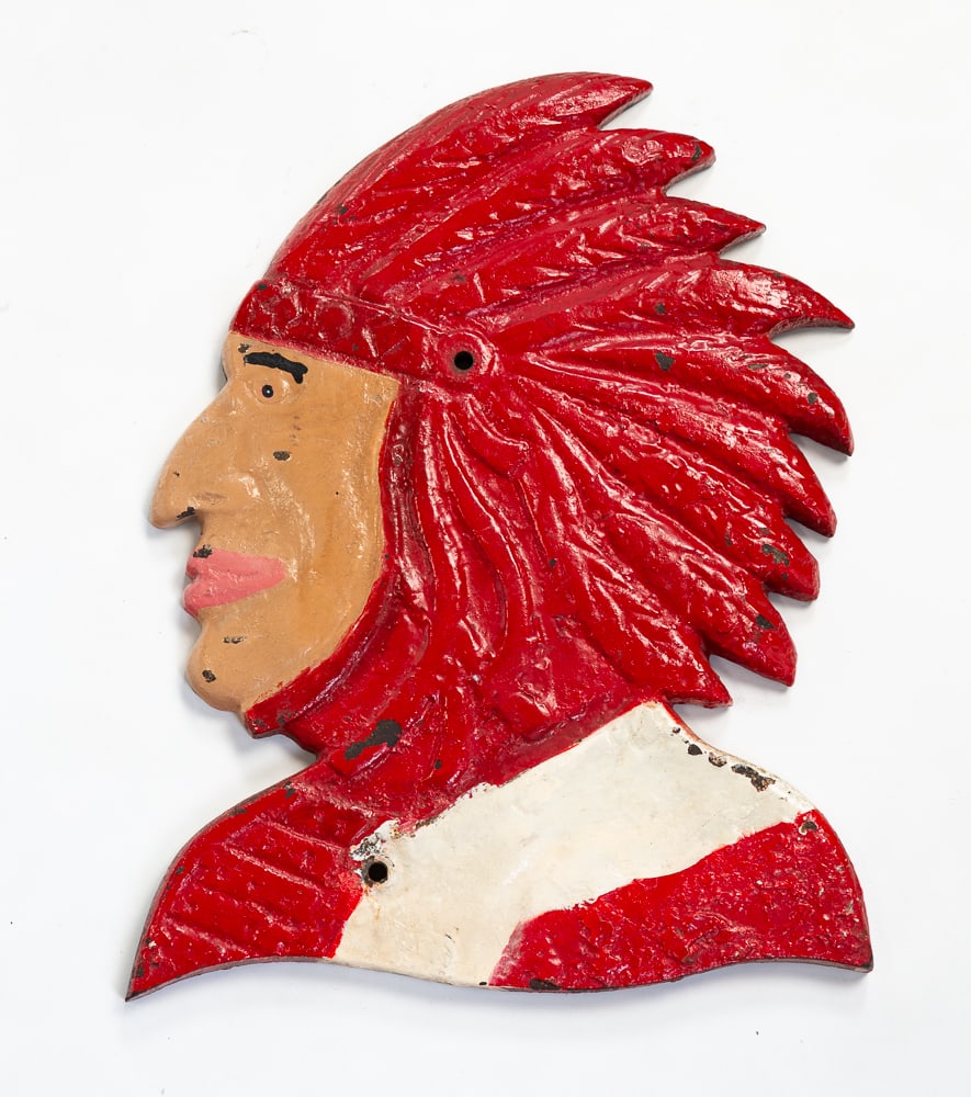 SHOOTING GALLERY TARGET.: American, circa 1900. Cast Iron. Painted Native American Chief head. Some paint loss and surface wear. 15.75"h. `12"w