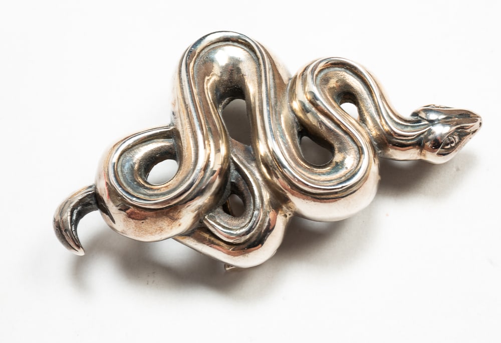 BARRY KIESELSTEIN-CORD STERLING SILVER BELT BUCKLE.: Mid- to late-20th Century. Slithering snake motif. Stamped "B. KIESELSTEIN CORD [illegible] STERLING" on back. 4"w. Approx. 2.9ozt.