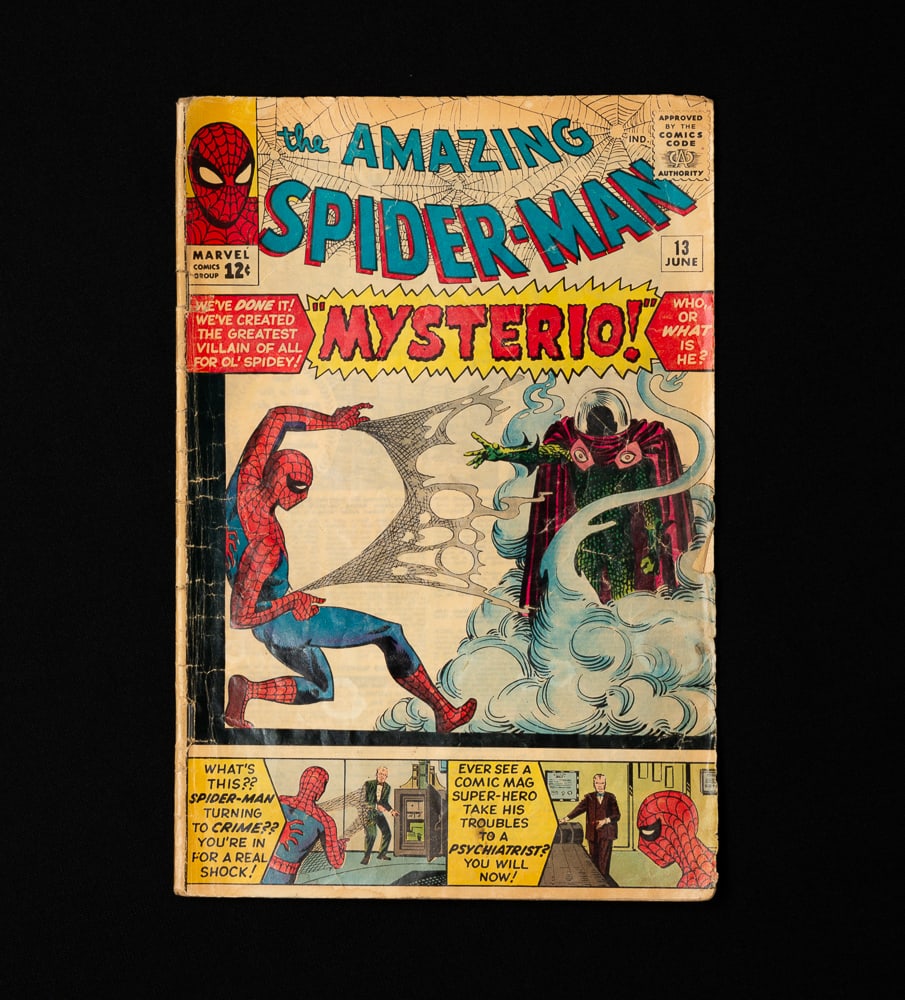 MARVEL COMICS "THE AMAZING SPIDERMAN" #13.: American, 1964. Story by Stan Lee. Art & Illustrations by Steve Ditko. Key issue with the first appearance of Mysterio. Ungraded. Wear.