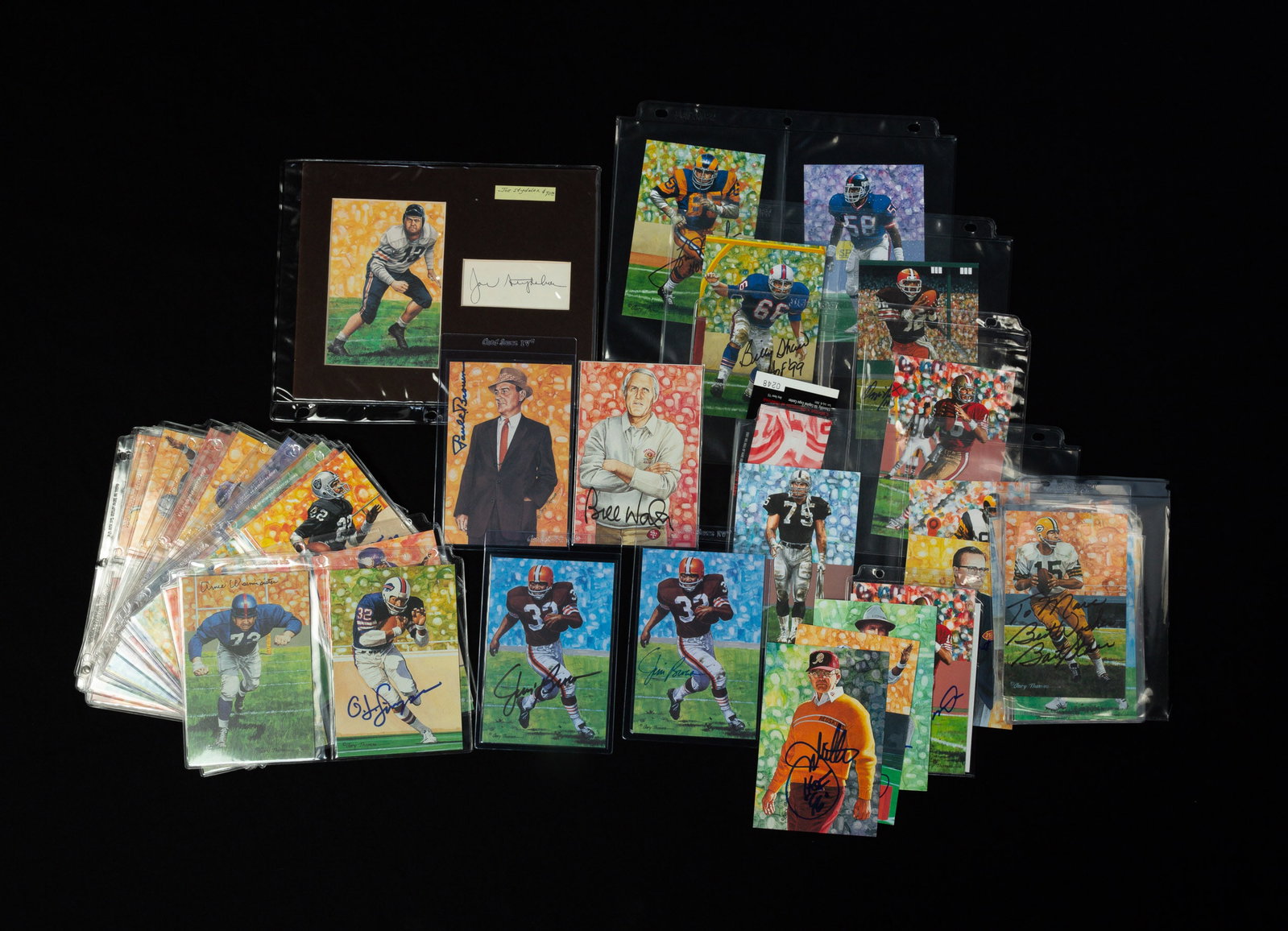 COLLECTION OF AUTOGRAPHED PRO FOOTBALL HALL OF FAME CARDS.: American, 20th Century. Autographed cards featuring signatures from O.J. Simpson, Willie Lanier, Gale Sayers, Chuck Badnarik, George Blanda and others. Ex. The Lifetime Sports Memorabilia Collection o