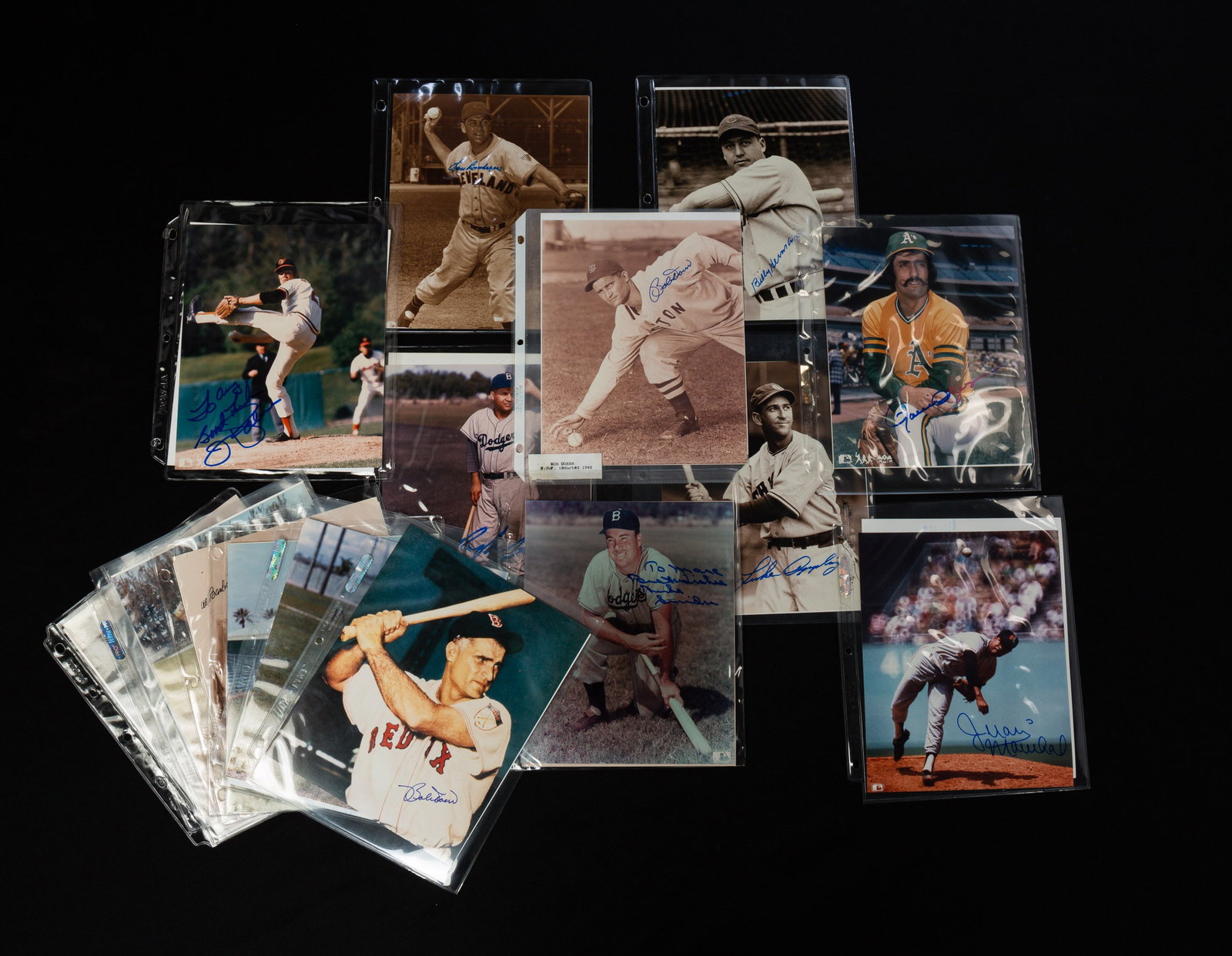AUTOGRAPHED BASEBALL PLAYER PHOTOGRAPHS.: American, 20th Century. Featuring Bob Doerr, Billy Hermann, Rick Ferrell, Bob Lemon, George Kell, Warren Spahn, Bob Feller and more. Approximately 30 photographs. Ex. The Lifetime Sports Memorabilia C