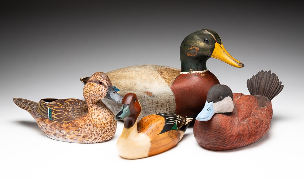 FOUR SIGNED WOOD DUCK DECOYS.: American, late-20th Century. The first signed by W.D. Sarni; the second signed by H. Heap III and Robert Lee; the third signed by Pat Kane; the fourth signed by Mike and Nancy Scherer. Largest 8"h. 17