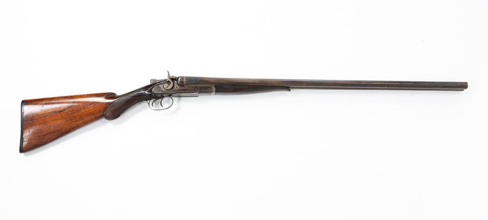 L.C. SMITH 12 GAUGE DOUBLE BARREL HAMMER SHOTGUN.: All original, fair condition.