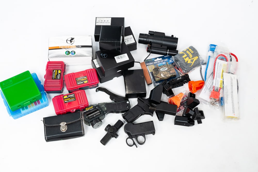 INTERESTING ASSORTMENT OF GUN ACCESSORIES.: Includes scopes, laser sights, reloading equipment, gun locks and interesting miscellaneous. Overall good condition.