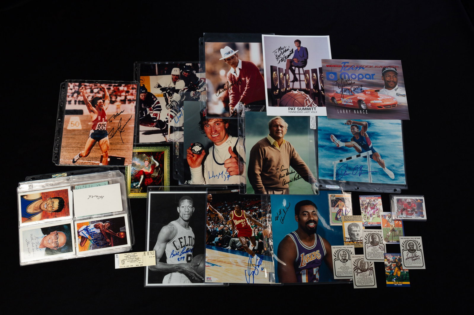 PROFESSIONAL ATHLETE AUTOGRAPH COLLECTION.: American, 20th Century. Includes photographs, trading cards and newspaper clippings and papers. Featuring signatures from Wayne Gretzky, Arnold Palmer, Chichi Rodriguez, Larry Nance, Bill Russell, Der