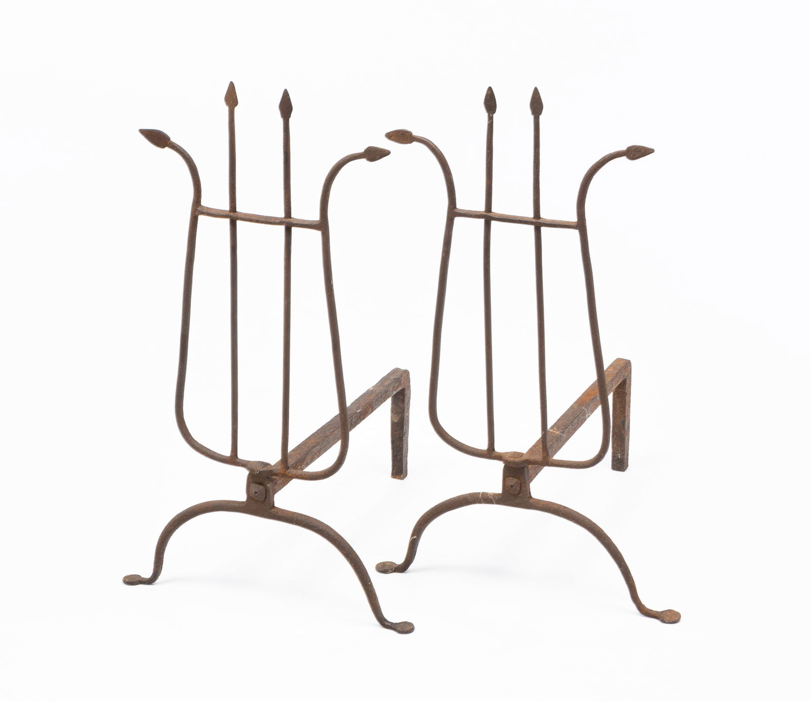 PAIR OF UNUSUAL IF NOT UNIQUE HAND-FORGED IRON LYRE SHAPED ANDIRONS. (1 of 3)
