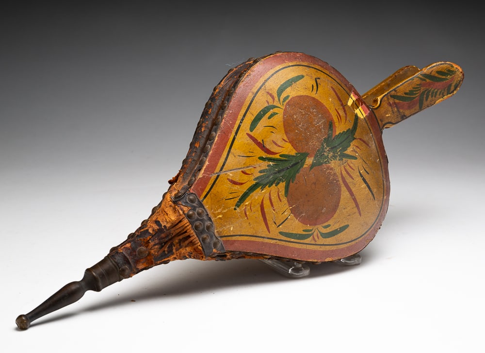 PAINT-DECORATED TURTLE-BACK BELLOWS.: American (possibly Pennsylvania), mid-19th Century. Turtle-back form with painted fruits and leaves in yellow, red and green. 18"l.