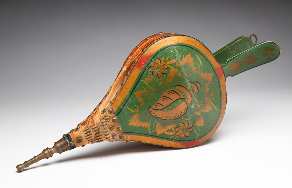 PAINT-DECORATED TURTLE-BACK BELLOWS.: American (possibly Pennsylvania), mid-19th Century. Turtle-back form with stenciled decoration in green and gold. 18"l.