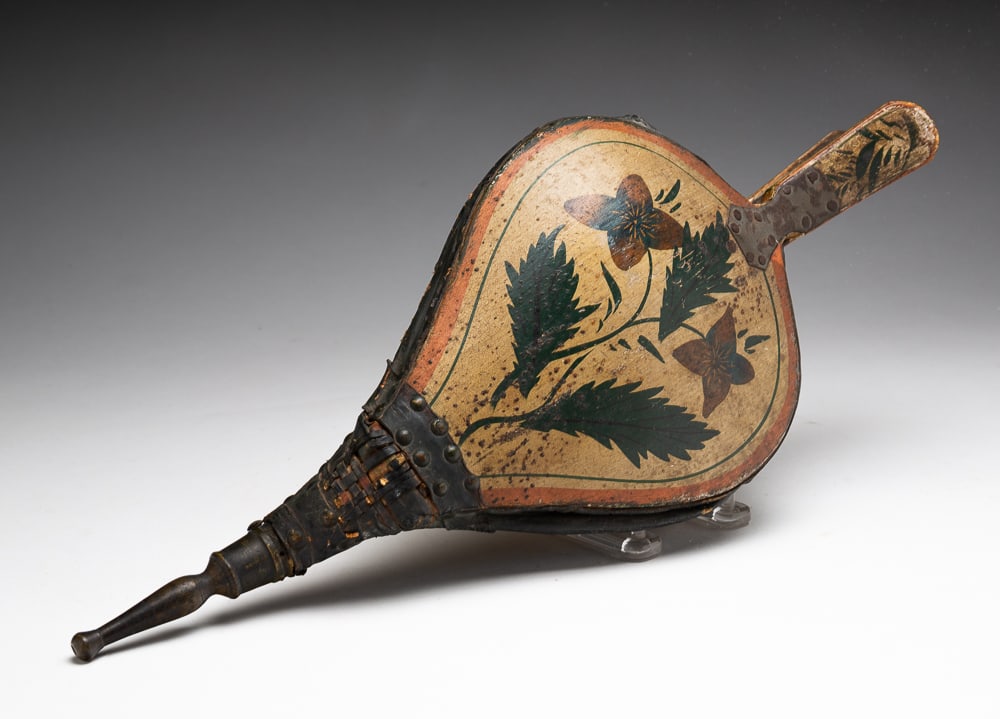 PAINT DECORATED TURTLE-BACK BELLOWS.: American (possibly Pennsylvania), mid-19th Century. With painted flowers and leaves. 17.25"l.