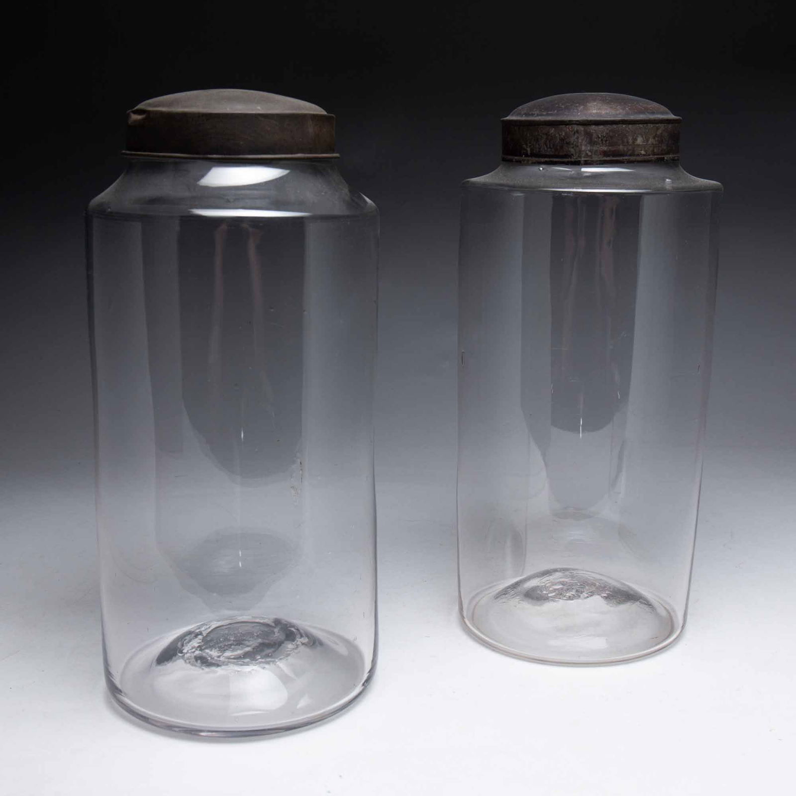 TWO BLOWN FLINT GLASS CANISTERS. (1 of 1)
