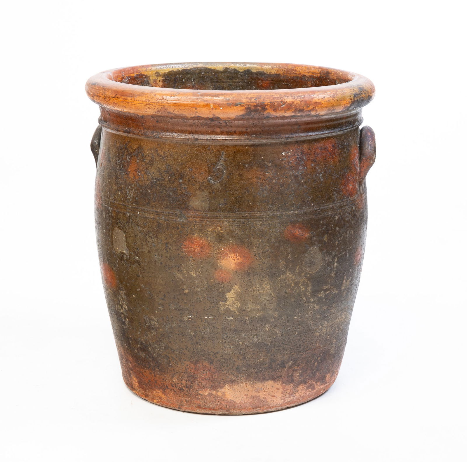 HANDLED REDWARE JAR.: HANDLED REDWARE JAR. American, 19th Century. Lug handles with rolled lip and banding. Nice mottled surface with incised "5". Overall very nice condition. 13.5"h. 12.5"d. Sold at Garth's Auctions (Dela