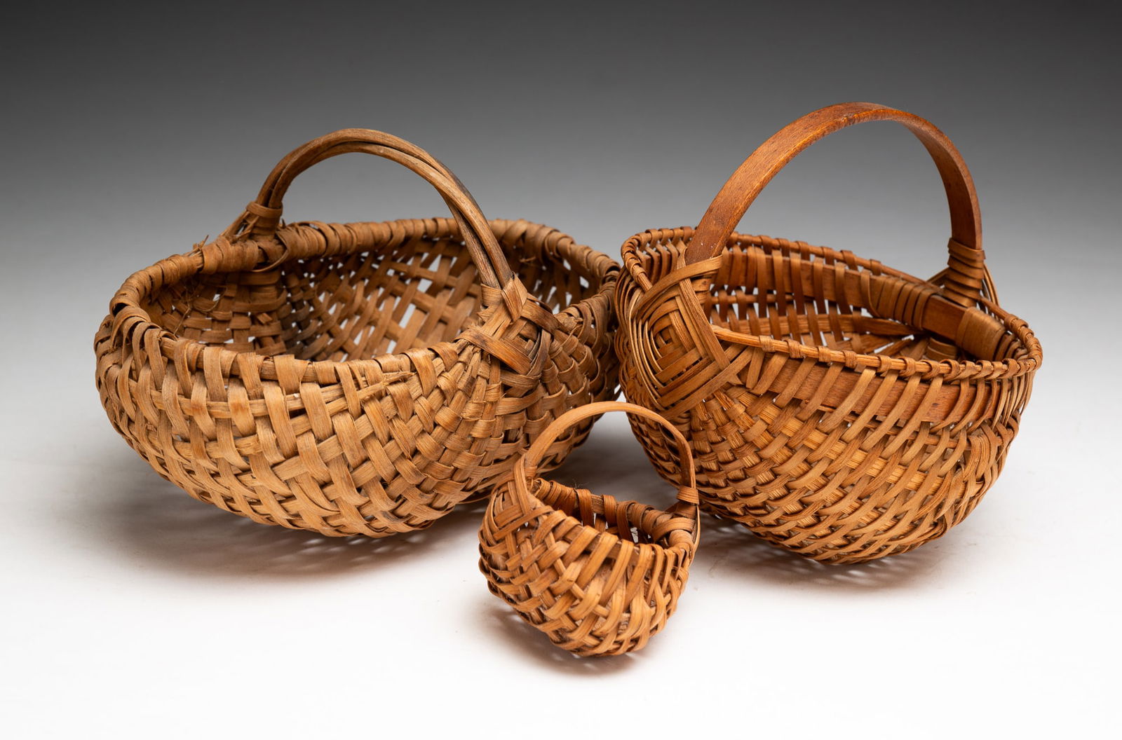 THREE MINIATURE BUTTOCKS BASKETS. (1 of 3)