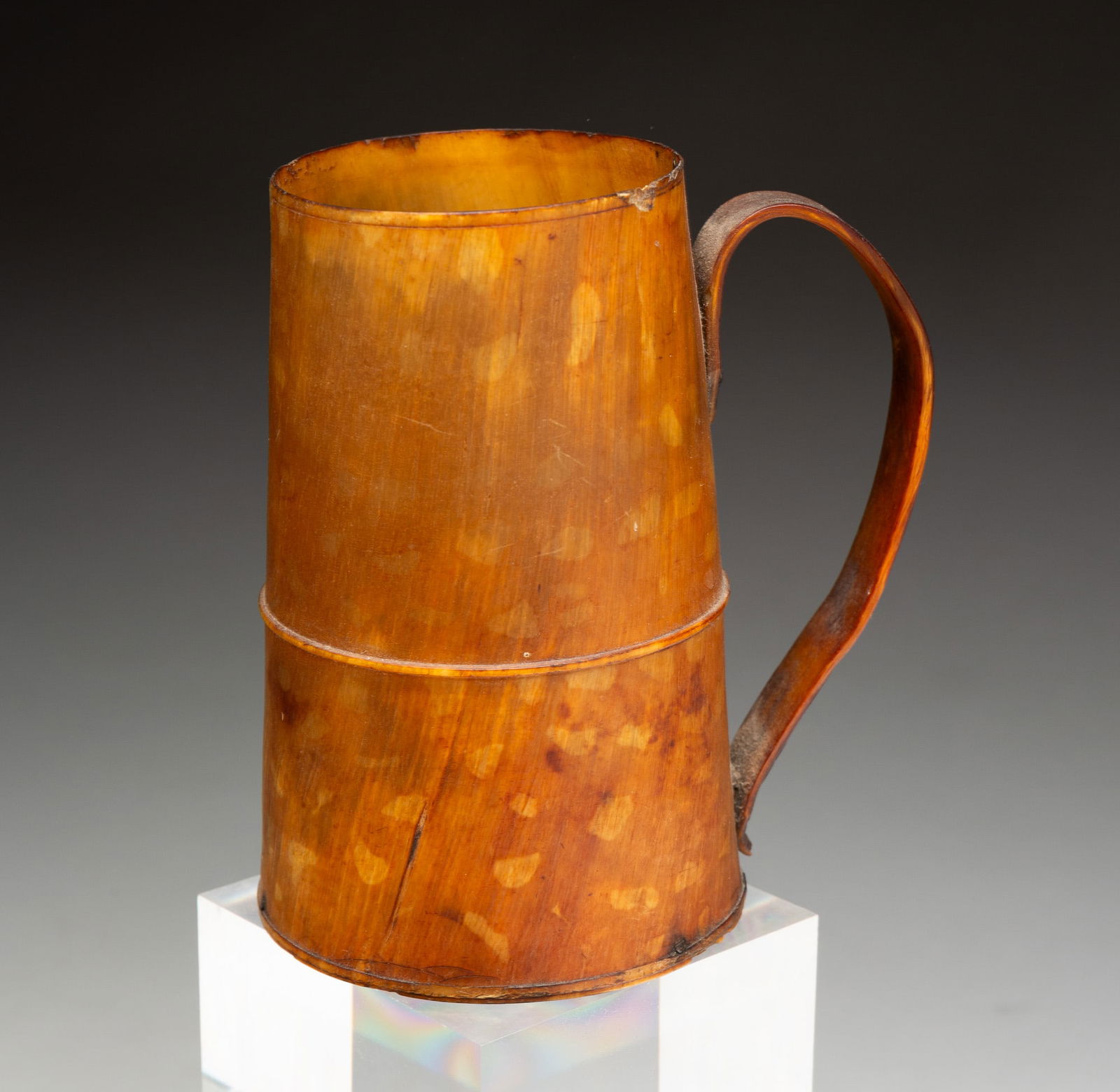 HANDLED HORN CUP.: HANDLED HORN CUP. England, 19th Century. Canted sides with applied handle. 5"h. Ex Mackay & Field (Ashford, Connecticut). From the collection of Carol Schulman (Chesterland, Ohio).