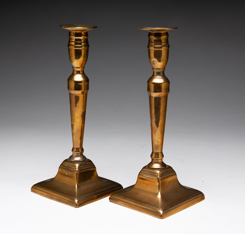 PAIR OF GEORGIAN BRASS PUSH-UP CANDLESTICKS. (1 of 3)