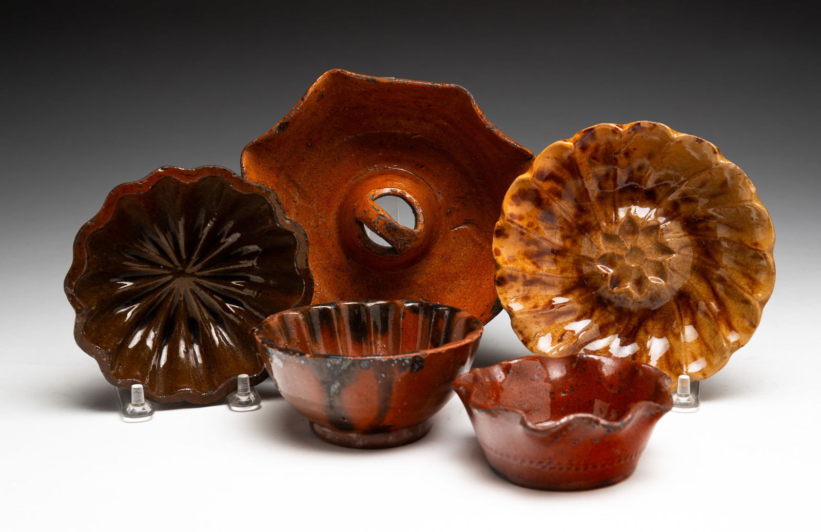 FIVE GLAZED REDWARE PIECES. (1 of 2)