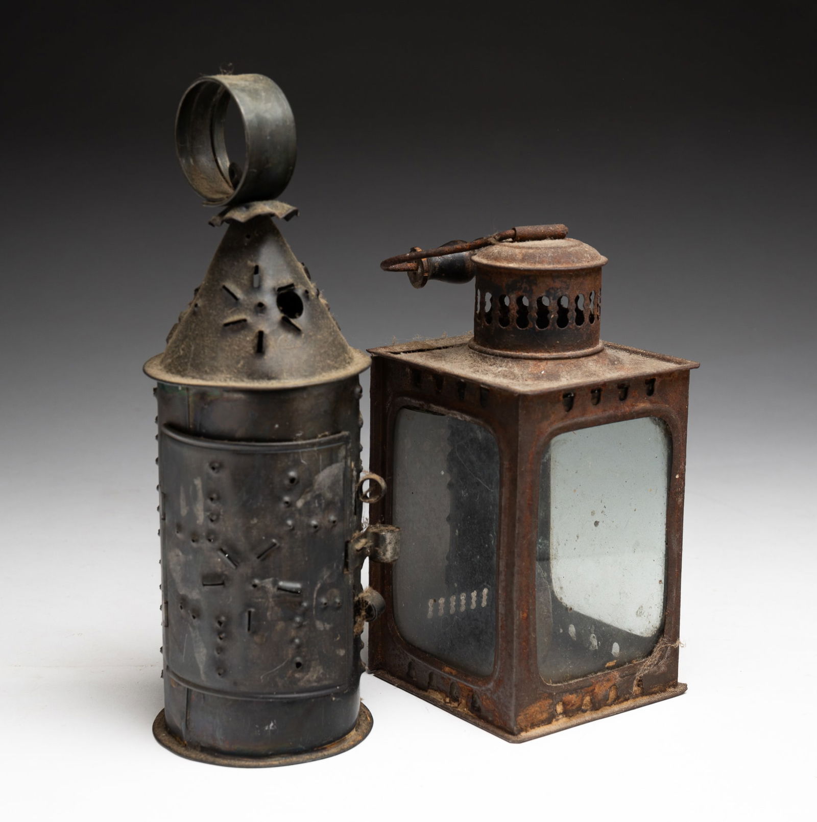 TWO TIN CANDLE LIGHTS. (1 of 4)