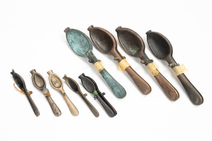GROUP OF SEVEN SPOON MOLDS.