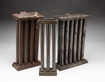 THREE TIN CANDLE MOLDS.