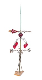 LIGHTNING ROD WITH HANGING GLASS PENDANTS.