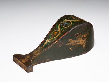 STYLIZED WHALE SHAPED WEIGHT.