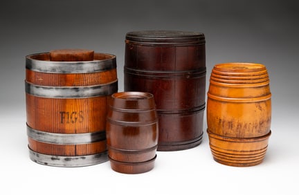 FOUR MINIATURE BARRELS.
