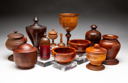 GROUP OF ELEVEN TREENWARE ITEMS AND A WOOD ADVERTISING JAR.