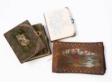 FOUR PHOTO ALBUMS.