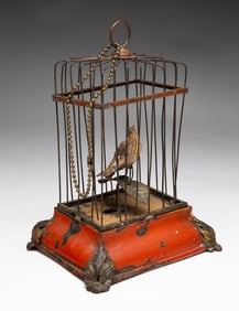 MECHANICAL BIRD IN CAGE PIPSQUEAK.